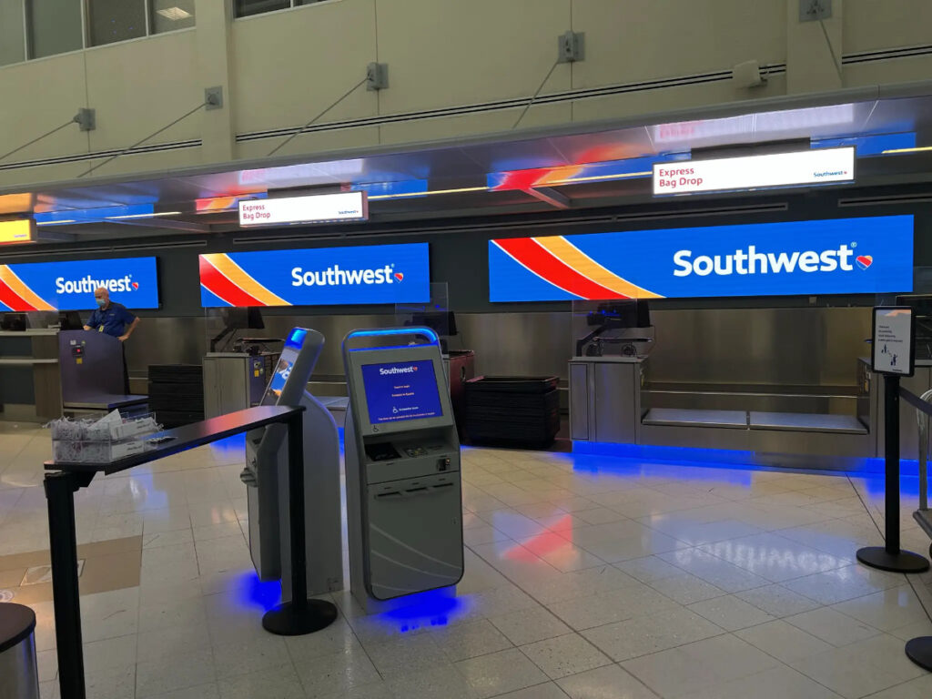 Sample photo of a vacant Southwest Airlines ticket counter to help readers learn about flying with firearms and ammo