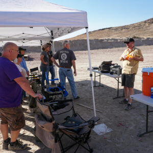 Students have assembled at the outdoor range and Bryan is instructing.