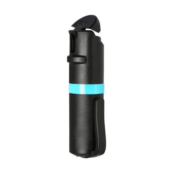The POM Clip pepper spray unit, shown quartering away to display the patented flip-top trigger system