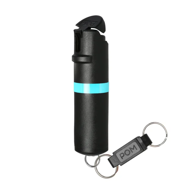 POM Key pepper spray unit with quick-release tether, quartering away to show patented Flip-Top triggering feature